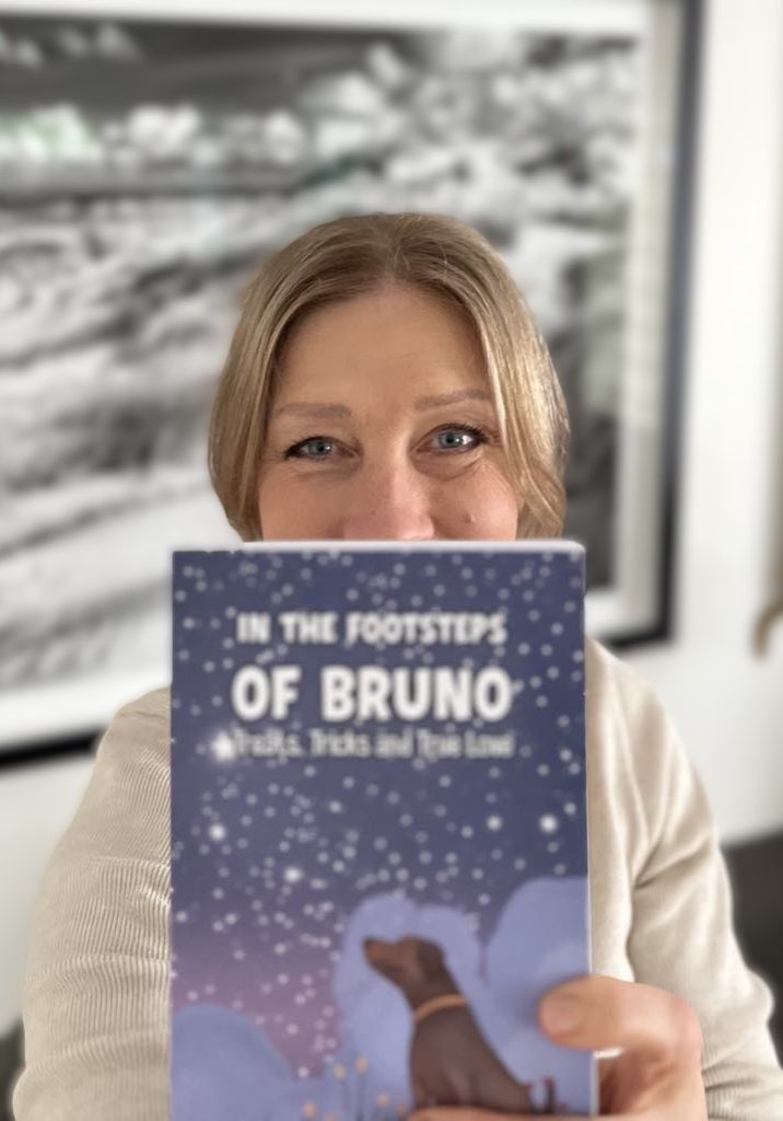 Smiling and happy launching her first book, In The Footsteps of Bruno